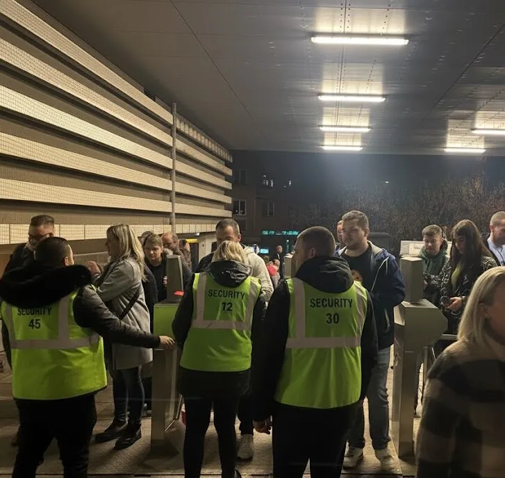 Stewarding staff at an event entrance in Brno